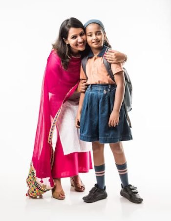 indian-mother-helping-school-girl-with-uniform-getting-ready-with-lunch-box-hair-style-waiting-school-bus_466689-40327